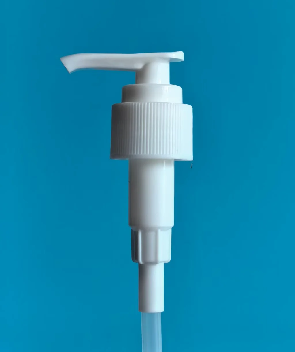 White ribbed-collar lotion pump, close-up